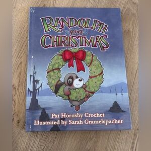 Randolph Saves Christmas Book with Red and Green Cover Hardback